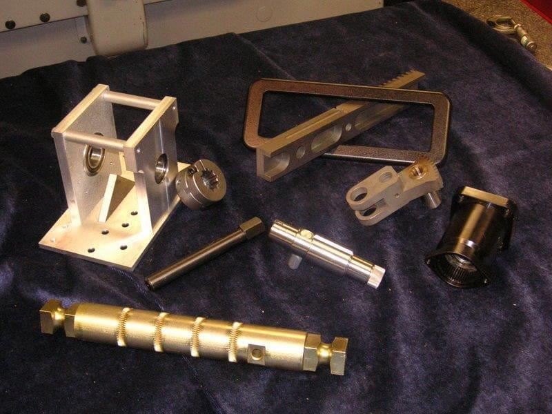 Finished CNC machined parts off the Haas and Doosan cells.