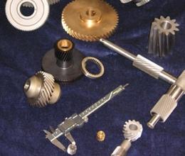 Custom machined gear and sprocket components.